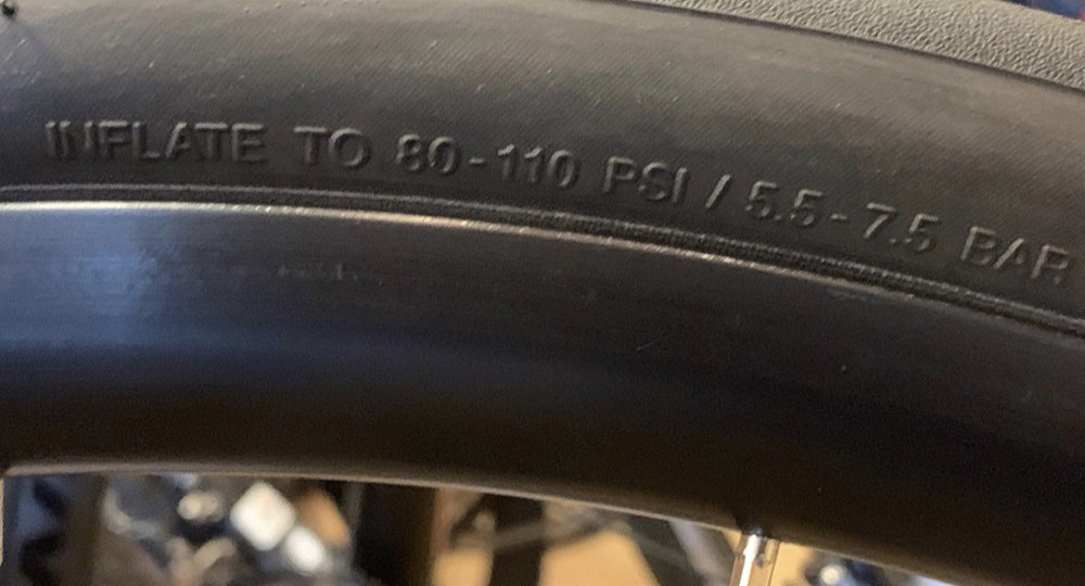 "how to find the proper bike tire pressure on your tire"